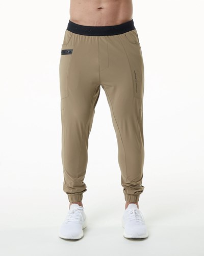 Alphalete Woven 4-Way Stretch 29" Pant Taupe | OBSRW1598