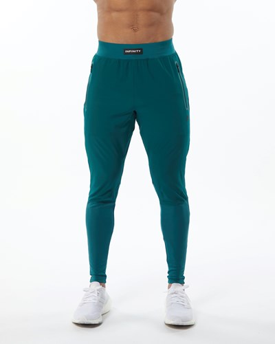 Alphalete Woven 4-Way Stretch 29" Pant Velvet Teal | OPYIB2573