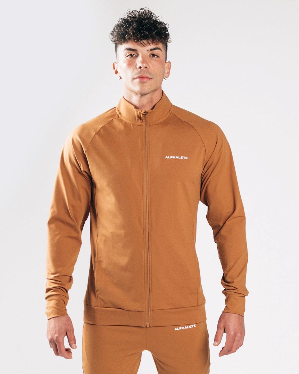 Alphalete 4-Way Stretch Track Jacket Camel | MBOXC4013