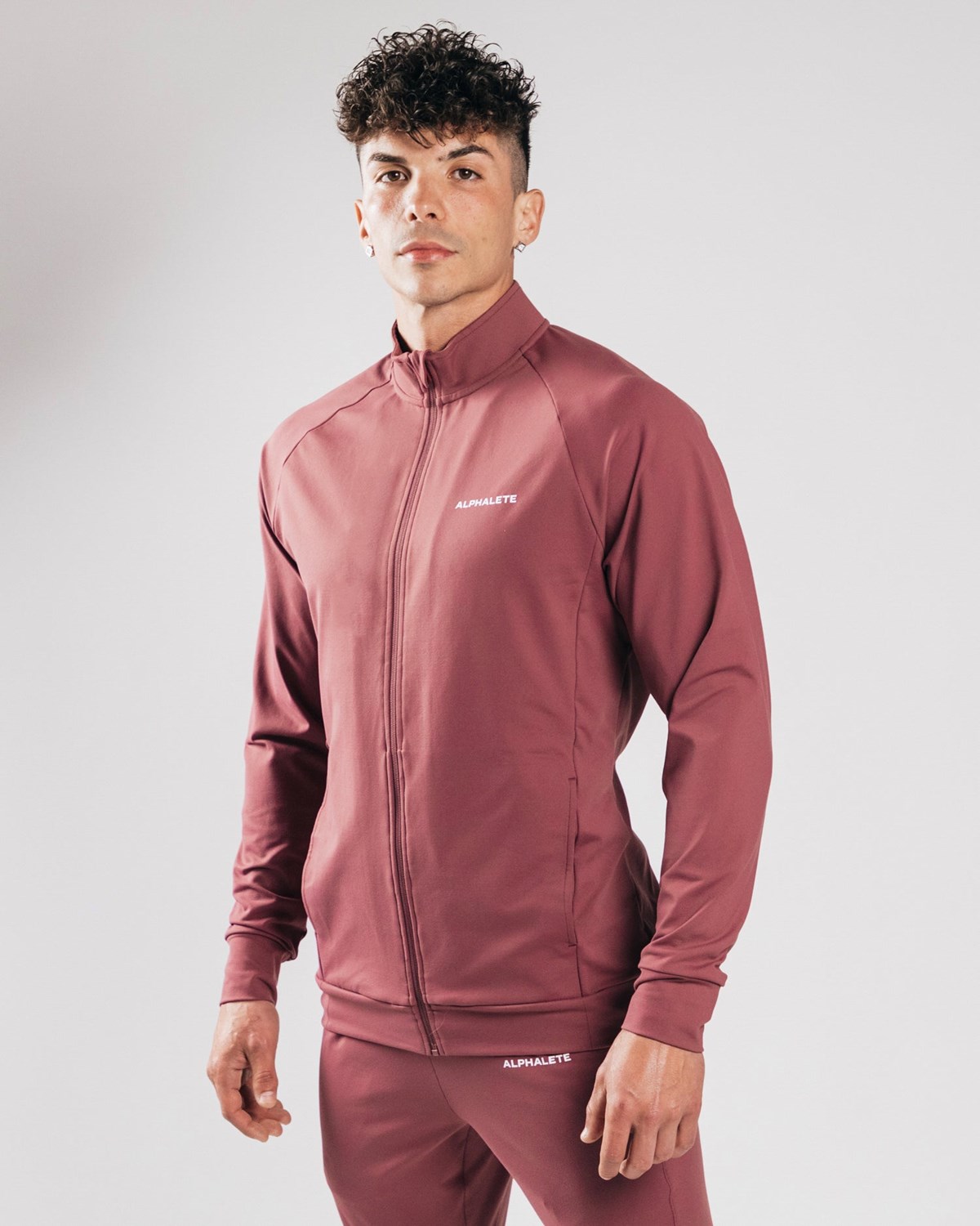 Alphalete 4-Way Stretch Track Jacket Mauve | GCWLI0293