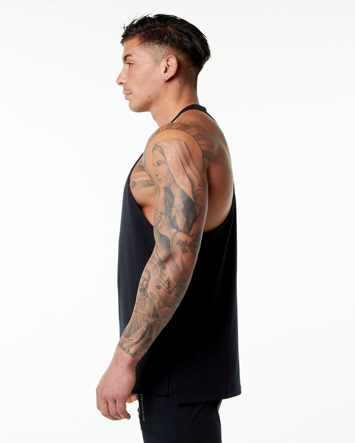 Alphalete Stepped Hem Stringer Sort | UMWCV3279